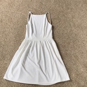 Fancying Women’s White Open-Back Mini Dress
